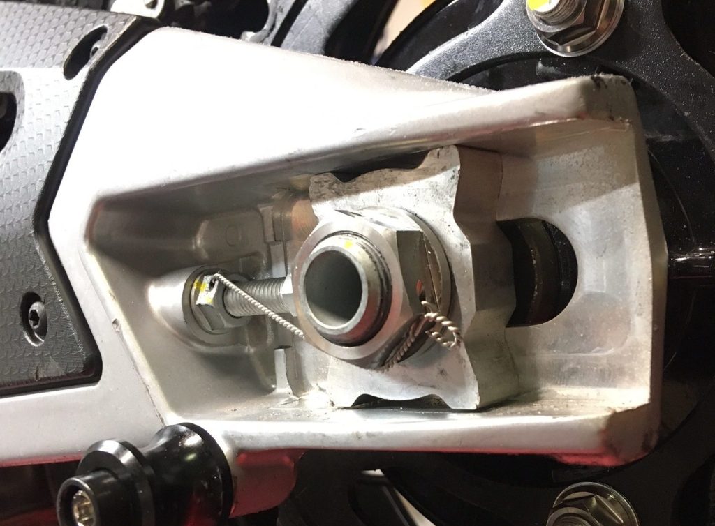 RS660 Titanium Rear Axle Nut - Pre-Drilled